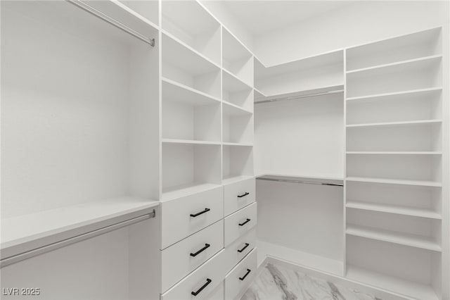 1616 Shadow Rock Dr, Las Vegas, NV 89117 - spacious closet featuring light marble finish flooring