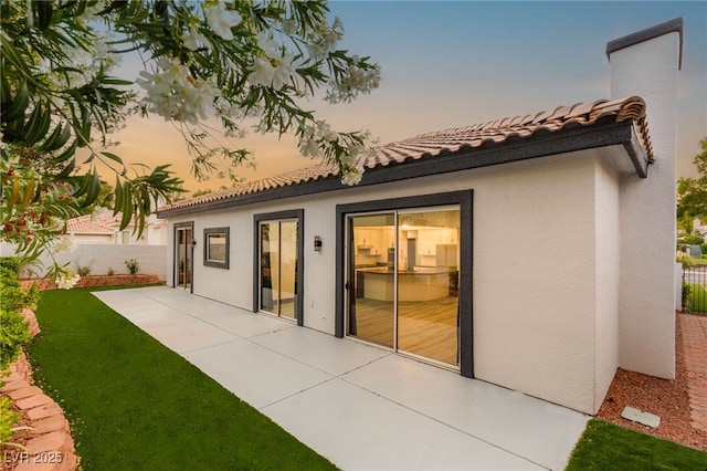 1616 Shadow Rock Dr, Las Vegas, NV 89117 - rear view of property with stucco siding, a patio area, and a tile roof