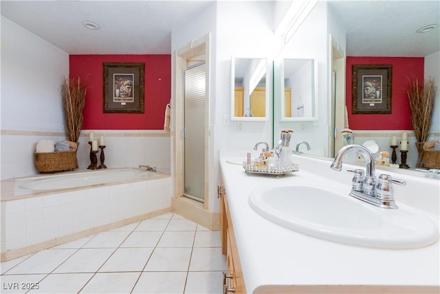 905 White Thunder St, Henderson, NV 89002 - full bath with a bath, double vanity, tile patterned flooring, and a stall shower