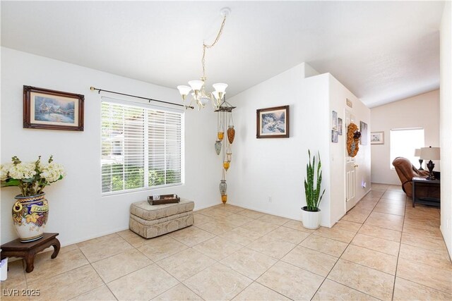 905 White Thunder St, Henderson, NV 89002 - entryway with lofted ceiling, a chandelier, and light tile patterned flooring