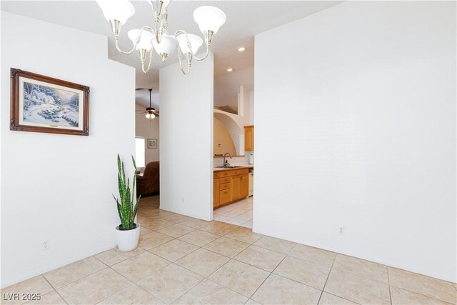 905 White Thunder St, Henderson, NV 89002 - spare room with light tile patterned floors, a chandelier, a sink, and recessed lighting