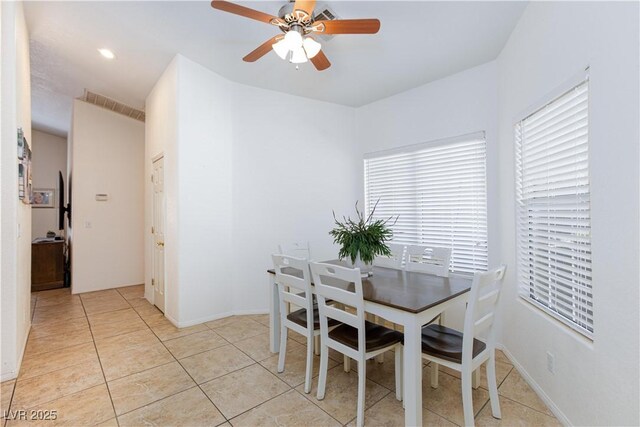 905 White Thunder St, Henderson, NV 89002 - dining room with a ceiling fan and light tile patterned floors