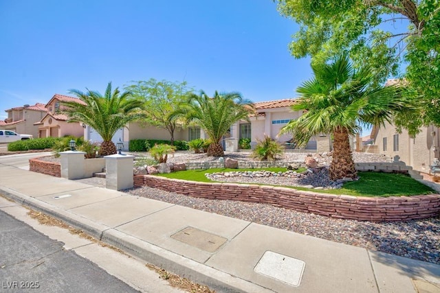 905 White Thunder St, Henderson, NV 89002 - mediterranean / spanish house featuring stucco siding and a tiled roof