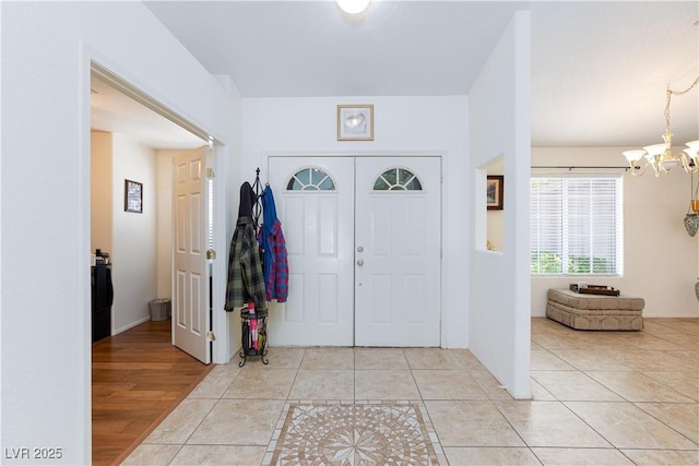 905 White Thunder St, Henderson, NV 89002 - entryway featuring a chandelier and light tile patterned floors