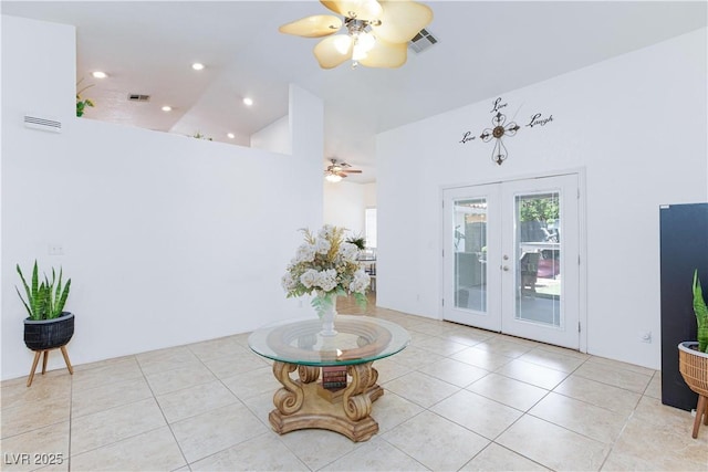 905 White Thunder St, Henderson, NV 89002 - tiled living room with a ceiling fan, french doors, high vaulted ceiling, and recessed lighting