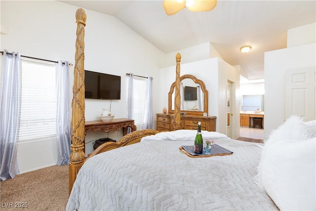 905 White Thunder St, Henderson, NV 89002 - bedroom with vaulted ceiling, multiple windows, carpet flooring, baseboards, and ensuite bathroom