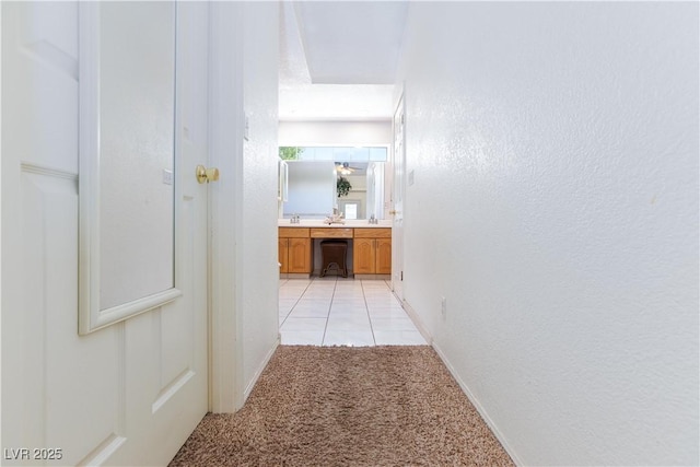 905 White Thunder St, Henderson, NV 89002 - corridor featuring light carpet and baseboards