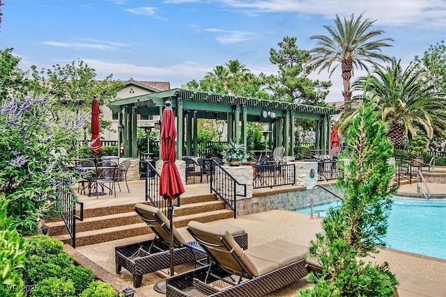8737 Red Brook Dr Unit 201, Las Vegas, NV 89128 - rear view of property with a community pool, a patio area, and a gazebo