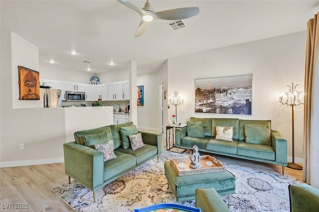 8737 Red Brook Dr Unit 201, Las Vegas, NV 89128 - living room with light wood-style floors, ceiling fan, baseboards, and recessed lighting