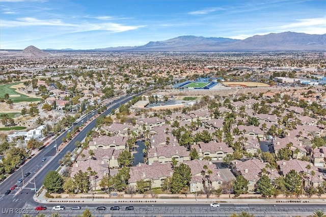 8737 Red Brook Dr Unit 201, Las Vegas, NV 89128 - aerial overview of property's location with a mountain backdrop and nearby suburban area