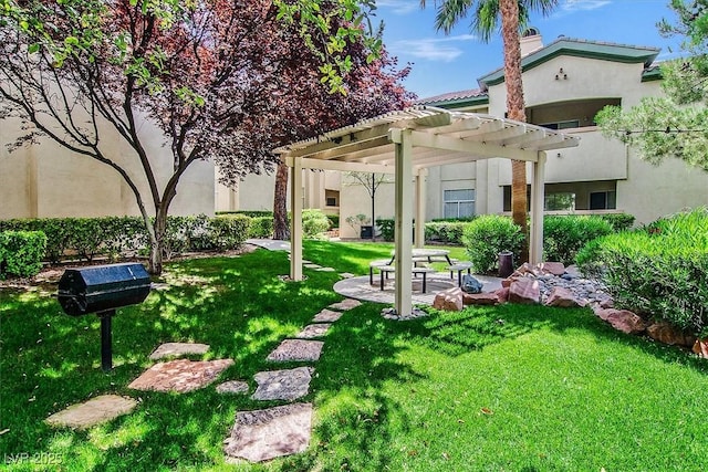 8737 Red Brook Dr Unit 201, Las Vegas, NV 89128 - view of grassy yard featuring a pergola