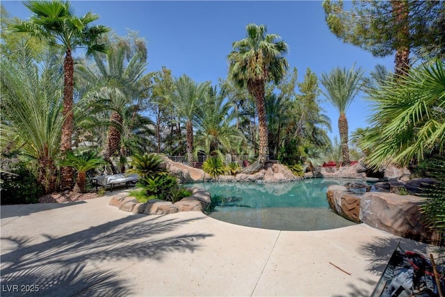 8717 Red Brook Dr Unit 201, Las Vegas, NV 89128 - swimming pool with a patio area
