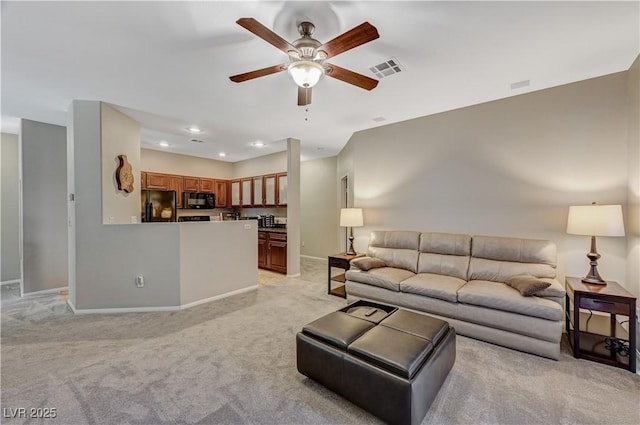 8717 Red Brook Dr Unit 201, Las Vegas, NV 89128 - living area featuring a ceiling fan, light carpet, baseboards, and recessed lighting