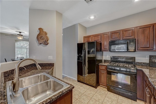 8717 Red Brook Dr Unit 201, Las Vegas, NV 89128 - kitchen with black appliances, a sink, dark stone counters, recessed lighting, and light tile patterned floors