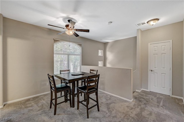 8717 Red Brook Dr Unit 201, Las Vegas, NV 89128 - dining area featuring ceiling fan, carpet, and baseboards