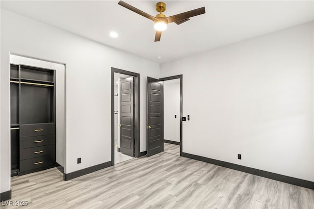 9029 Rivers Edge Dr, Las Vegas, NV 89117 - unfurnished bedroom featuring light wood-type flooring, baseboards, a closet, ceiling fan, and recessed lighting