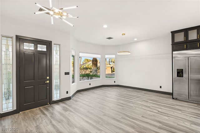 9029 Rivers Edge Dr, Las Vegas, NV 89117 - foyer entrance with a chandelier, light wood-style floors, baseboards, and recessed lighting