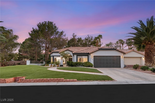 9029 Rivers Edge Dr, Las Vegas, NV 89117 - mediterranean / spanish-style home featuring stucco siding, an attached garage, concrete driveway, and a tile roof