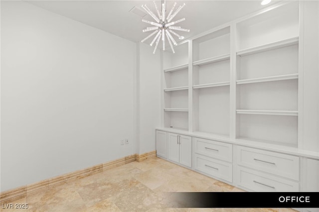 9101 Alta Dr Unit 102, Las Vegas, NV 89145 - unfurnished dining area featuring a chandelier