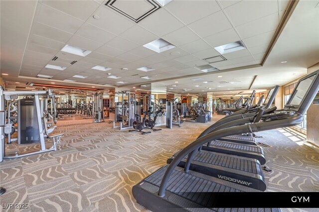 9101 Alta Dr Unit 102, Las Vegas, NV 89145 - exercise room featuring a paneled ceiling and carpet floors