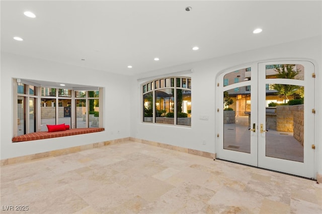 9101 Alta Dr Unit 102, Las Vegas, NV 89145 - spare room featuring recessed lighting, french doors, baseboards, and stone finish flooring