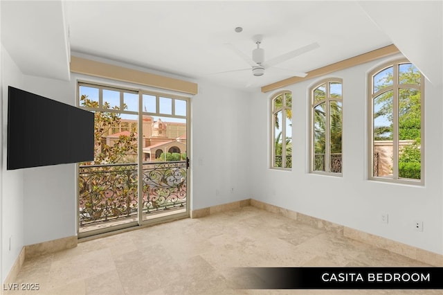 9101 Alta Dr Unit 102, Las Vegas, NV 89145 - unfurnished room with a ceiling fan, healthy amount of natural light, and baseboards
