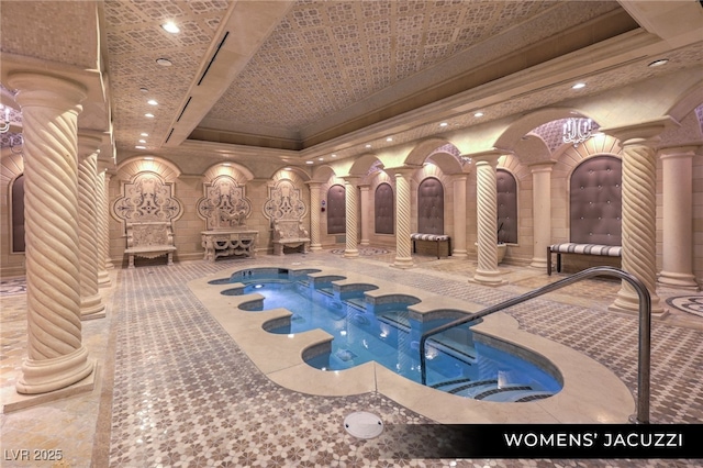 9101 Alta Dr Unit 102, Las Vegas, NV 89145 - view of swimming pool with ornate columns and a jacuzzi