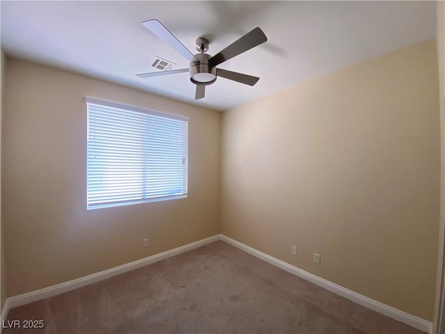 5376 S Conquistador St, Las Vegas, NV 89148 - empty room featuring a ceiling fan, light colored carpet, and baseboards