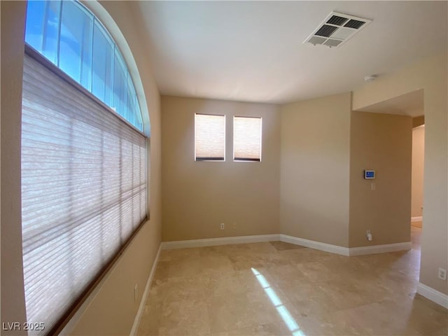 5376 S Conquistador St, Las Vegas, NV 89148 - spare room with baseboards and a smoke detector
