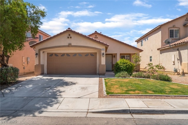2825 Shayla Bay Ave, North Las Vegas, NV 89086 - mediterranean / spanish home with stucco siding, concrete driveway, an attached garage, a front yard, and a tile roof