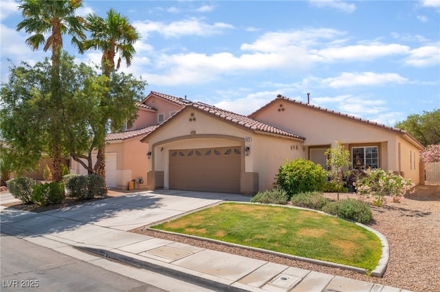 2825 Shayla Bay Ave, North Las Vegas, NV 89086 - mediterranean / spanish-style house with an attached garage, concrete driveway, stucco siding, a tiled roof, and a front lawn