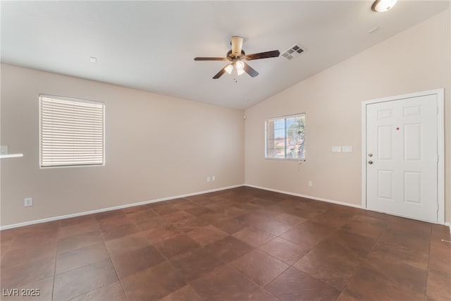 2825 Shayla Bay Ave, North Las Vegas, NV 89086 - unfurnished room featuring ceiling fan, baseboards, dark tile patterned flooring, and high vaulted ceiling