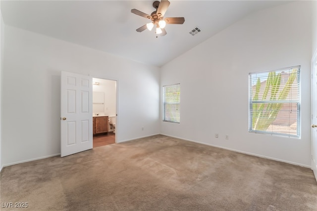 2825 Shayla Bay Ave, North Las Vegas, NV 89086 - spare room featuring light colored carpet, high vaulted ceiling, a ceiling fan, and healthy amount of natural light