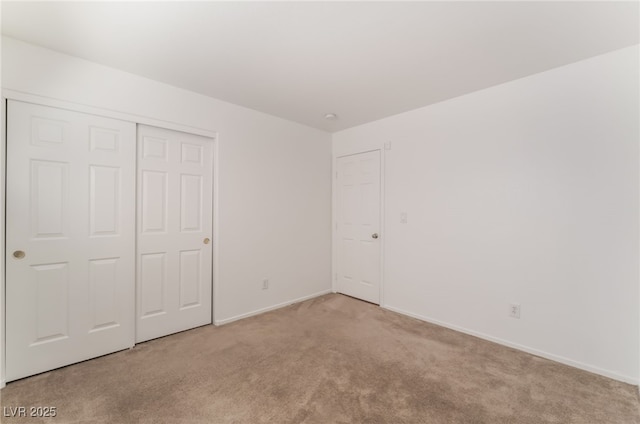 2825 Shayla Bay Ave, North Las Vegas, NV 89086 - unfurnished bedroom with carpet, baseboards, and a closet