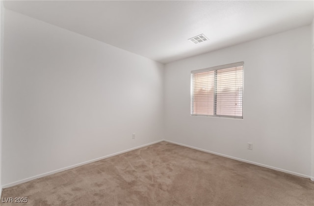 2825 Shayla Bay Ave, North Las Vegas, NV 89086 - unfurnished room with light colored carpet and baseboards