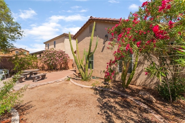 2825 Shayla Bay Ave, North Las Vegas, NV 89086 - view of yard featuring a patio area