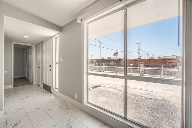 4558 Sheppard Dr, Las Vegas, NV 89122 - unfurnished room featuring baseboards and marble finish flooring