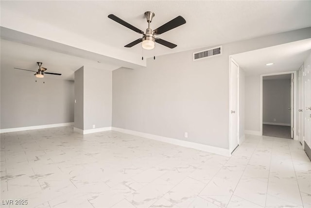 4558 Sheppard Dr, Las Vegas, NV 89122 - spare room with a ceiling fan, light marble finish floors, and baseboards