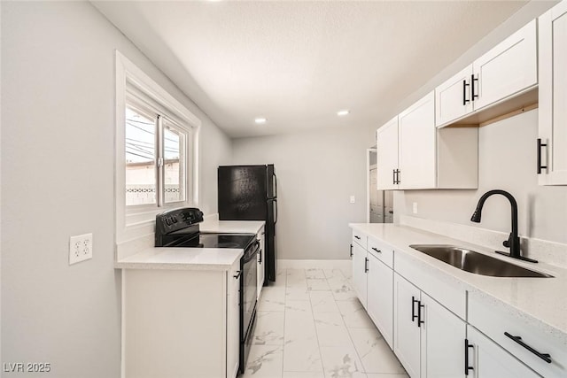 4558 Sheppard Dr, Las Vegas, NV 89122 - kitchen with black appliances, a sink, light marble finish floors, white cabinets, and recessed lighting