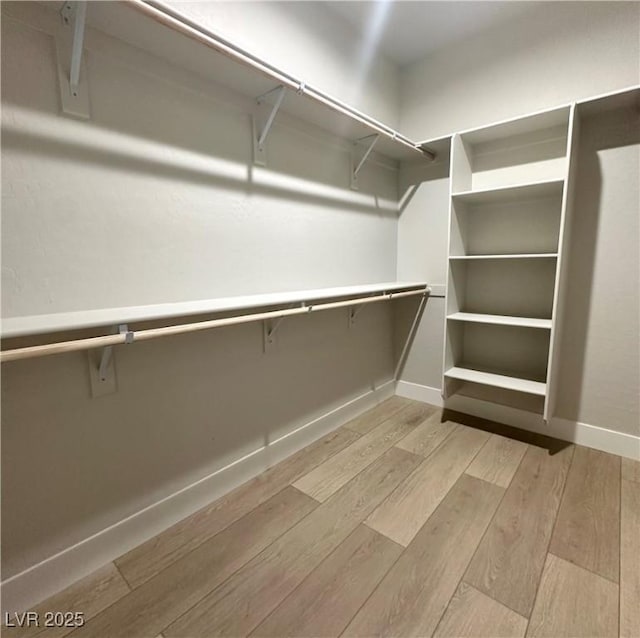 3791 Soplo Rd, Pahrump, NV 89048 - spacious closet with light wood-type flooring
