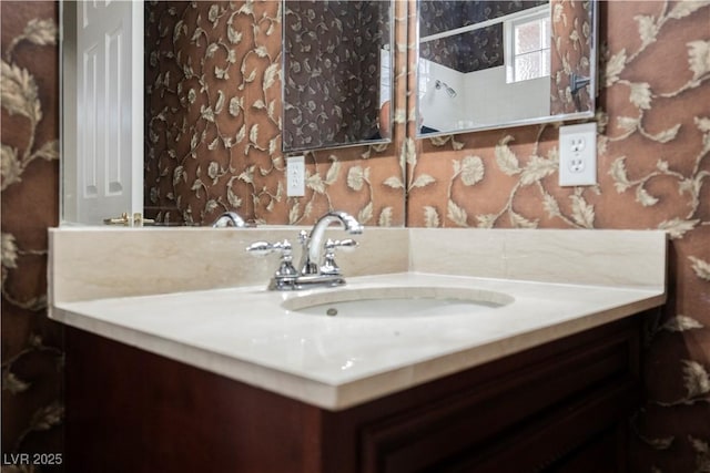 2050 W Warm Springs Rd Unit 4322, Henderson, NV 89014 - bathroom with vanity, wallpapered walls, and a shower