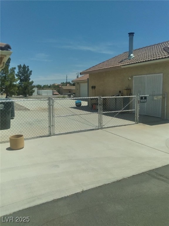 1611 Red Rock Dr, Pahrump, NV 89048 - exterior space featuring a gate