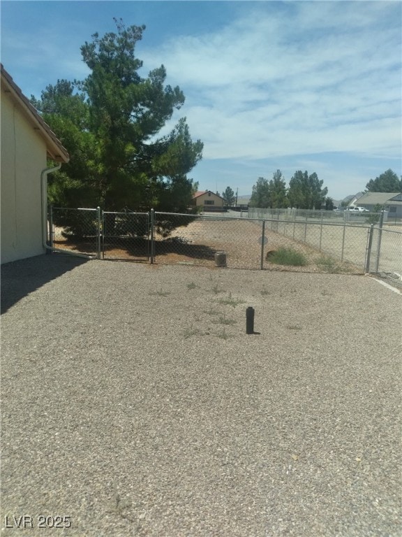 1611 Red Rock Dr, Pahrump, NV 89048 - view of yard with a gate