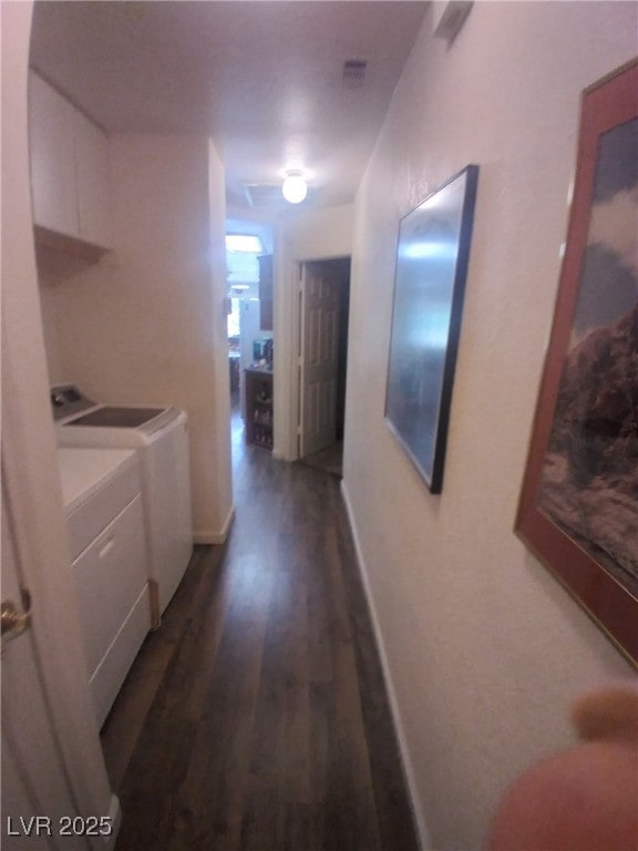 1611 Red Rock Dr, Pahrump, NV 89048 - hall with washer and dryer and wood finished floors