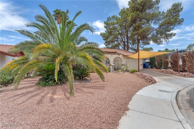 3158 La Luna Cir, Henderson, NV 89014 - mediterranean / spanish house with driveway, stucco siding, a garage, and a tiled roof