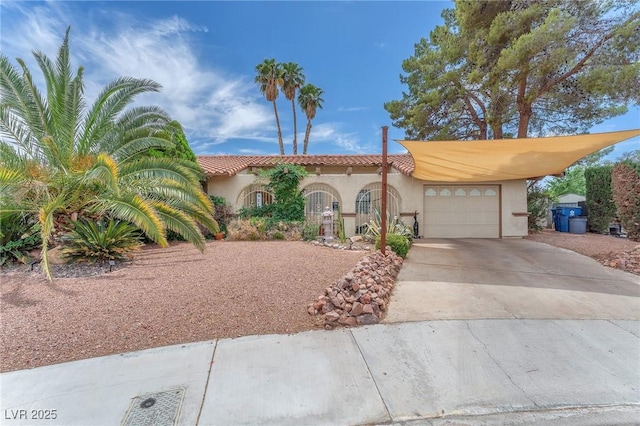 3158 La Luna Cir, Henderson, NV 89014 - view of front facade featuring an attached garage, stucco siding, driveway, and a tile roof