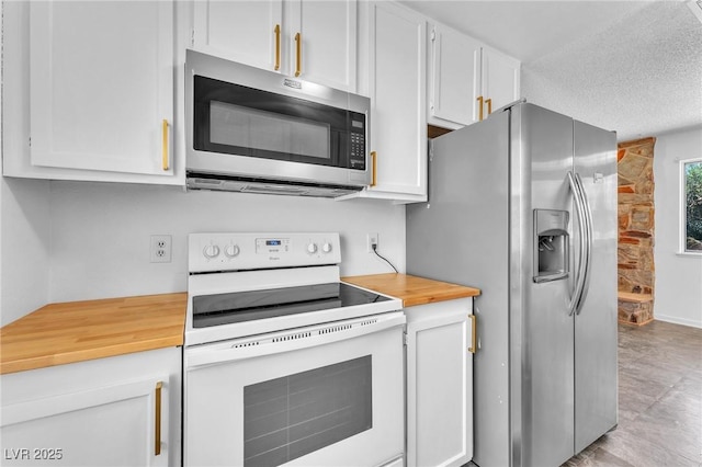 3158 La Luna Cir, Henderson, NV 89014 - kitchen with appliances with stainless steel finishes, wood counters, white cabinets, and a textured ceiling