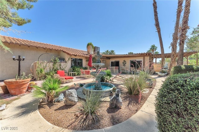3158 La Luna Cir, Henderson, NV 89014 - back of house featuring stucco siding, a patio area, and a tiled roof