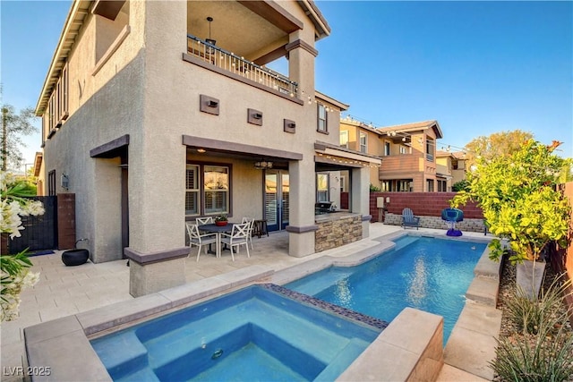 5434 Fawn Chase Way, Las Vegas, NV 89135 - view of swimming pool featuring a fenced backyard, a patio area, and a pool with connected hot tub