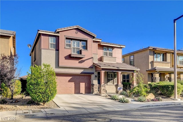 5434 Fawn Chase Way, Las Vegas, NV 89135 - view of front of home with concrete driveway, a garage, and stucco siding